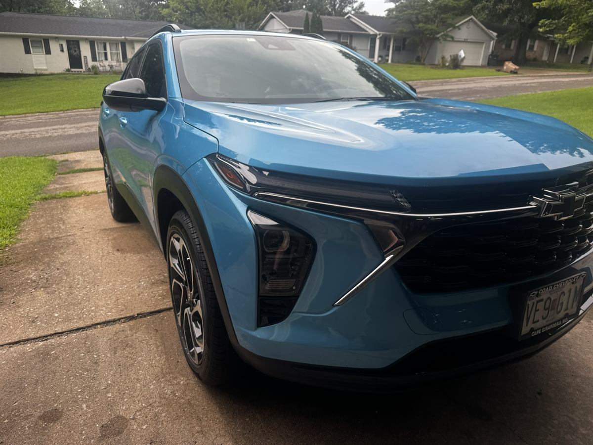 Blue Chevrolet, front three-quarter after an exterior detail