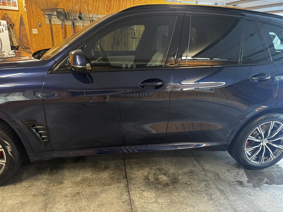 BMW X5 side profile with high-gloss paint