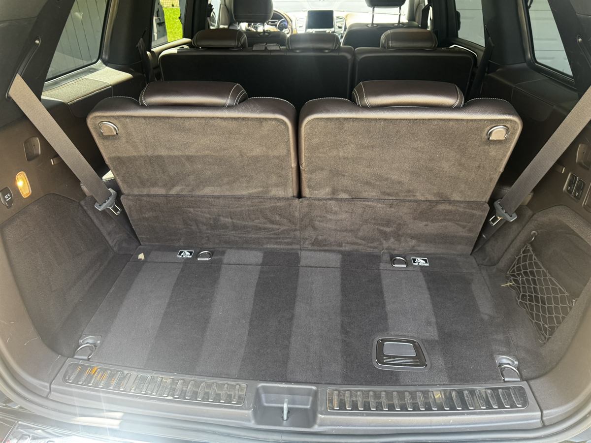 SUV cargo area vacuumed and wiped down